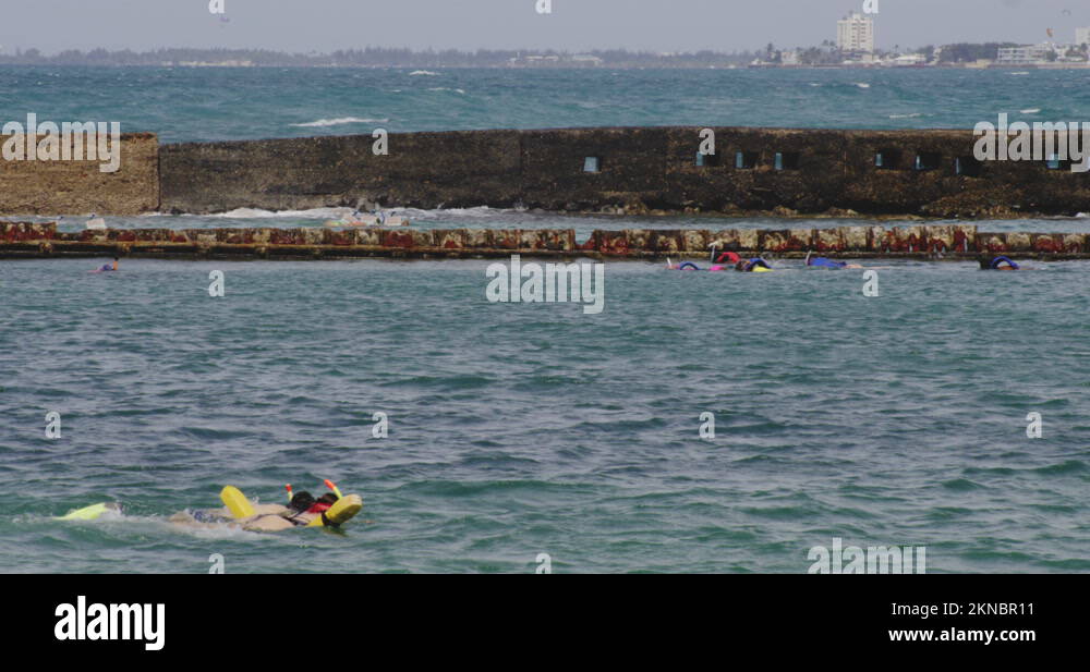 Tourist snorkeling in the sea water surface at San Juan Puerto Rico