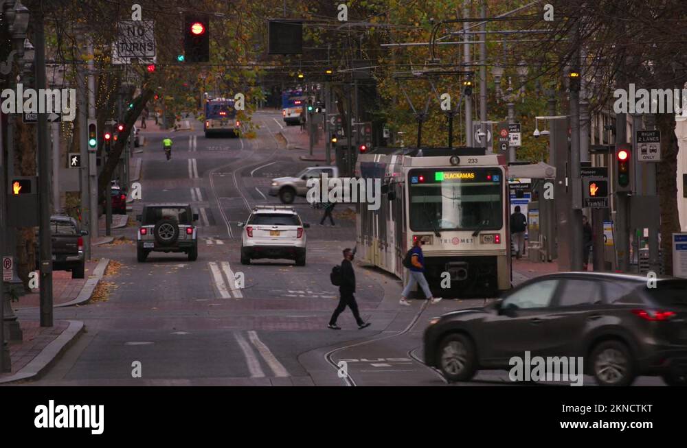 Portland, Oregon circa2021 City streets with cars, buses and light rail MAX Stock Video