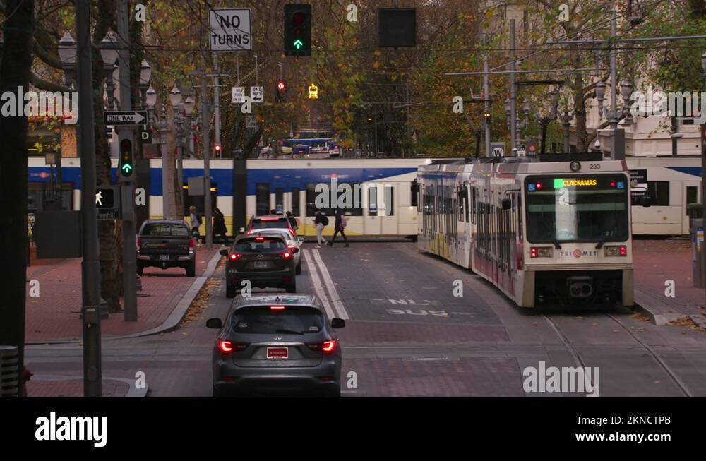 Portland, Oregon circa2021 City streets with cars, buses and light