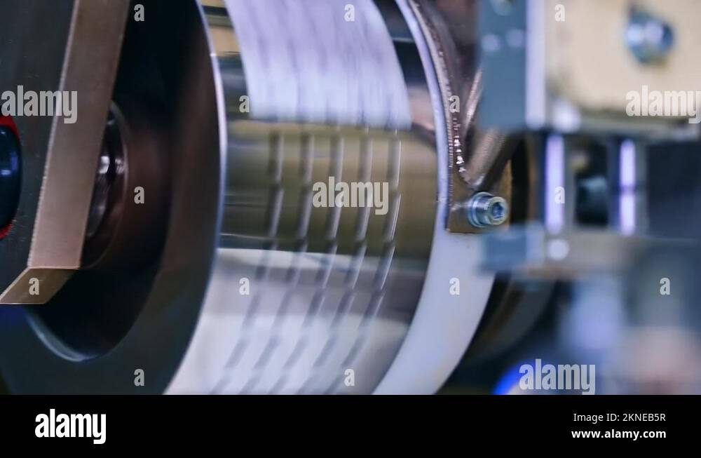 Factory technological producing diapers. Roller rotation automated ...