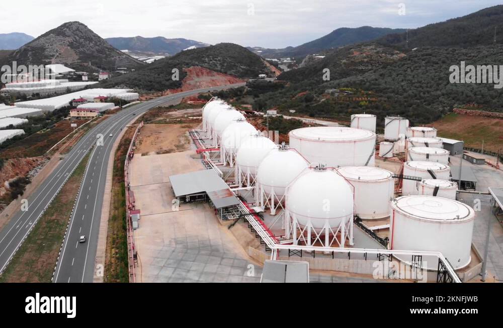 Huge gas and fuel tanks on plant. Enormous storage tanks in industrial