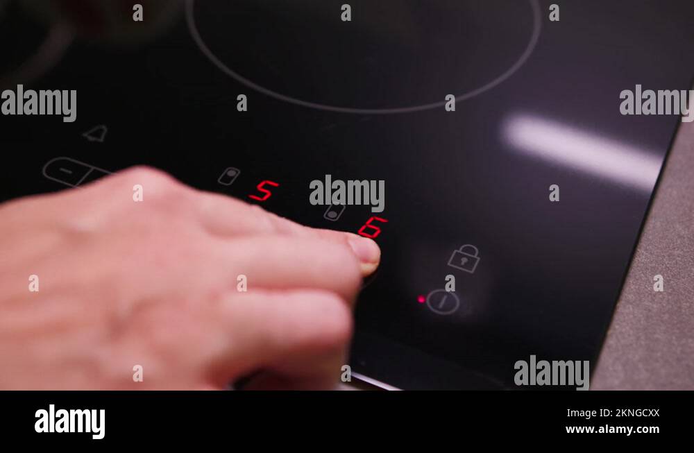 Induction cooktop hand Stock Videos & Footage HD and 4K Video Clips