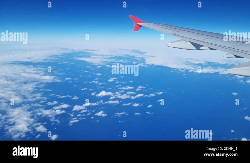 flight. wing of the aircraft in flight from window of aircraft Stock ...