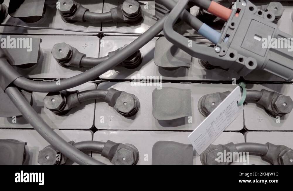 Modern new gray color battery blocks are connected by powerful jumpers