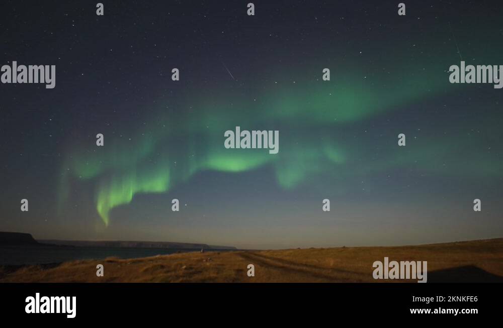 The beautiful dance of the northern lights in the starry night sky ...