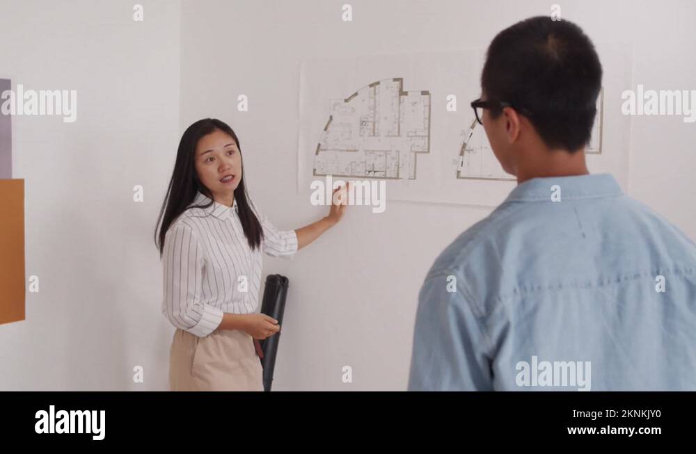 Creative Architects Discussing House Plan Stock Video Footage Alamy Creative Architects Discussing House Plan Stock Video Footage Alamy