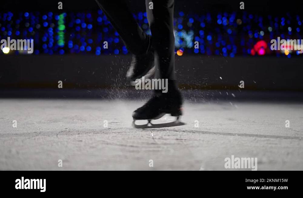 Figure skating, professional man gymnast performs a trick on ice, man spinning Stock Video