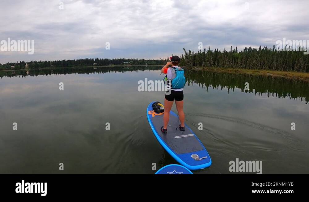 Woman paddle boarding river Stock Videos & Footage HD and 4K Video