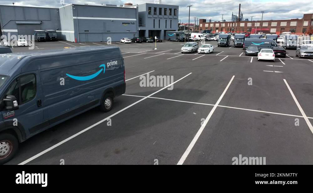 Amazon Prime delivery truck at Amazon Hub warehouse. Drivers deliver