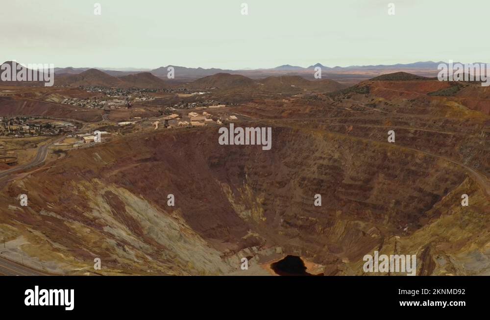 Bisbee. Arizona, USA, huge open pit copper mine, drone backwards 4k
