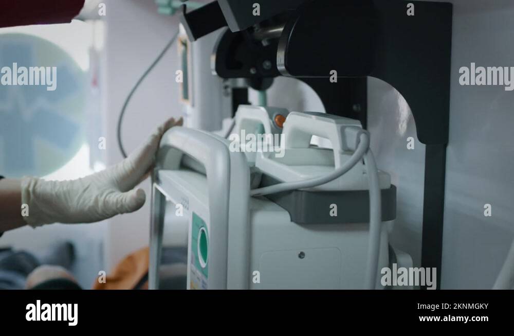 Crop paramedic using defibrillator in ambulance Stock Video Footage Alamy