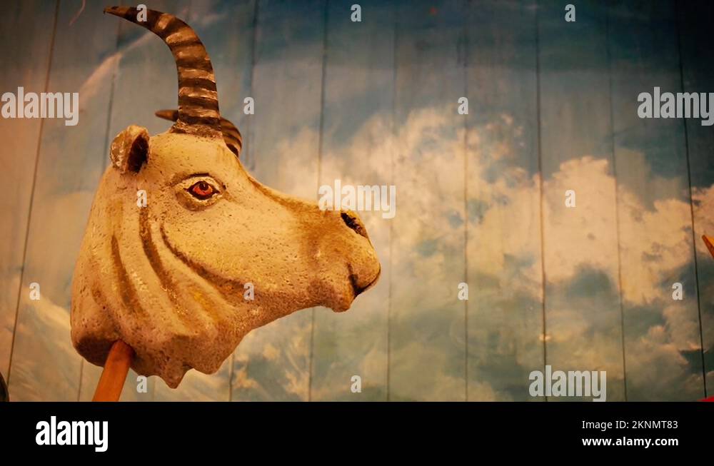 Goat head on a stick. Caroling. A traditional rite for Christmas Stock