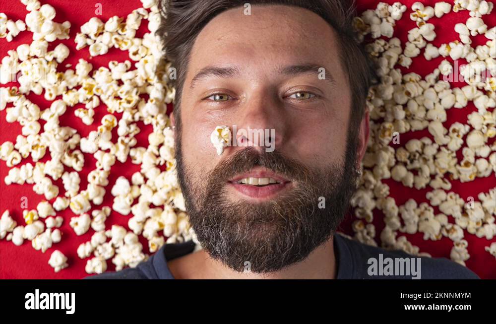 Man eating popcorn Stock Videos & Footage HD and 4K Video Clips Alamy