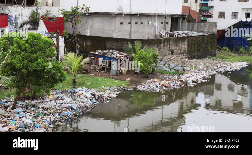 Monrovia Liberia poverty home pollution ocean bay shore 4K Stock Video
