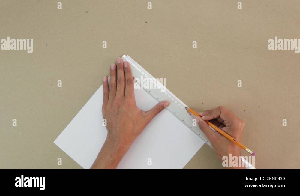 Making crafts. Tracing marks on white cardstock Stock Video Footage Alamy