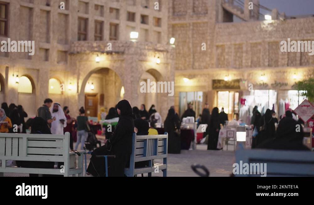 Qatari Community Qatari families walking in front Souq Waqif in Doha Qatar Stock Video ...