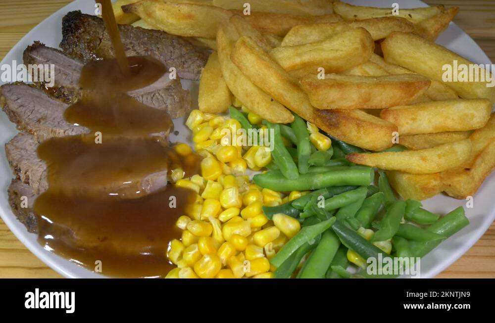 Roast beef gravy Stock Videos & Footage HD and 4K Video Clips Alamy
