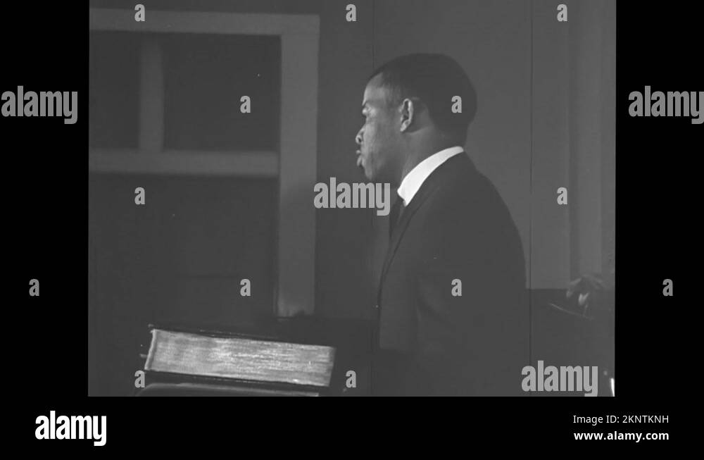 1960s: Man speaks behind a pulpit at a church. Martin Luther King Jr ...