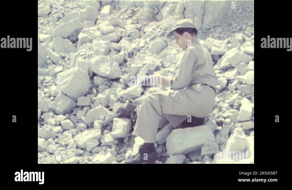 Man examining rocks Stock Videos & Footage - HD and 4K Video Clips - Alamy