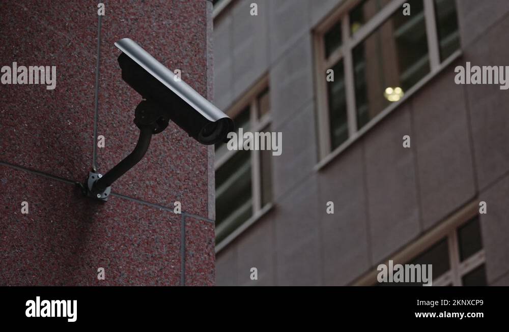 Security camera moving panning and tilting recording what's happening