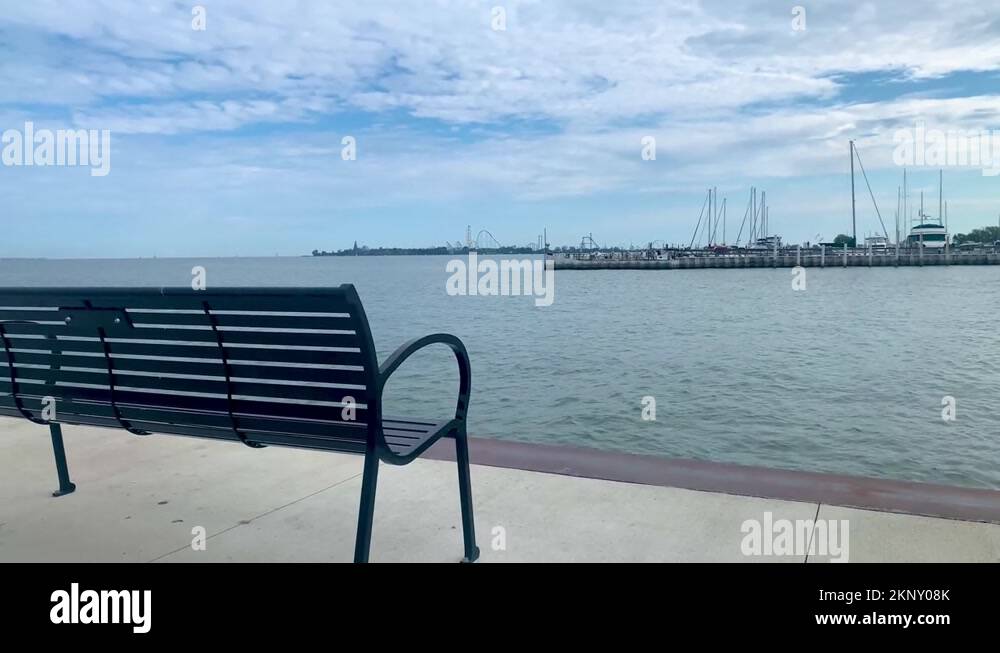 bench for sitting at Jackson Street Pier in Sandusky, Ohio Stock Video