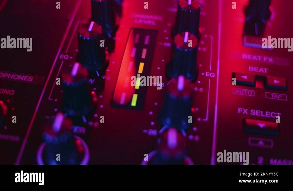 DJ mix studio audio tracks mixing buttons pads decks mixing console frequencies Stock Video