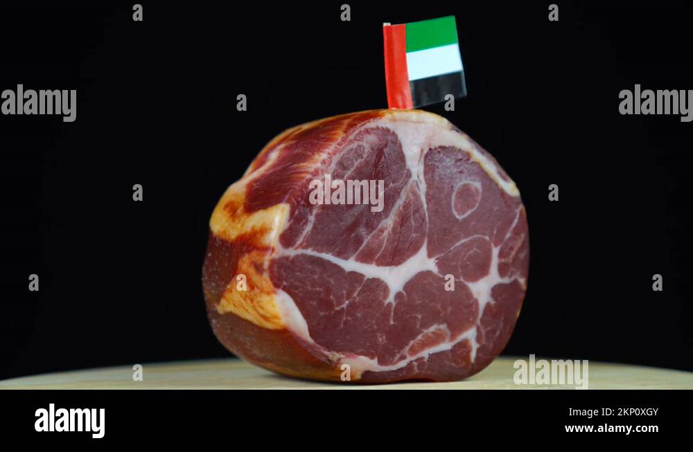 Delicious smoked tenderloin with small flag of United Arab Emirates