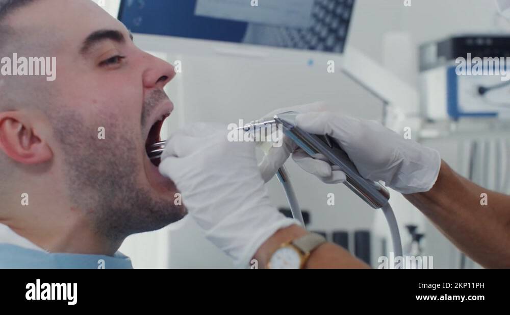Examination of the larynx of a male patient with the help of medical instruments Stock Video