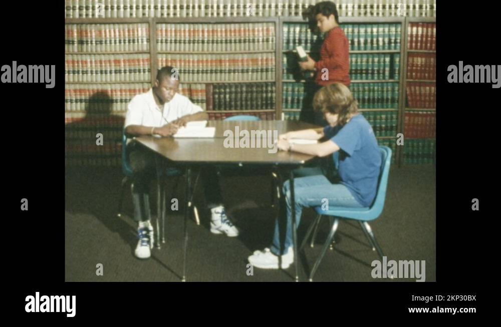 1980s Sign for Dallas County Juvenile Department. Teen boys in a law