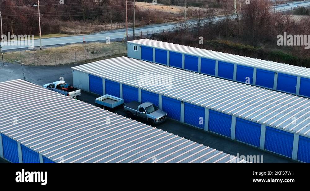 Pickup truck vehicles at self storage unit. Trailer to load and store