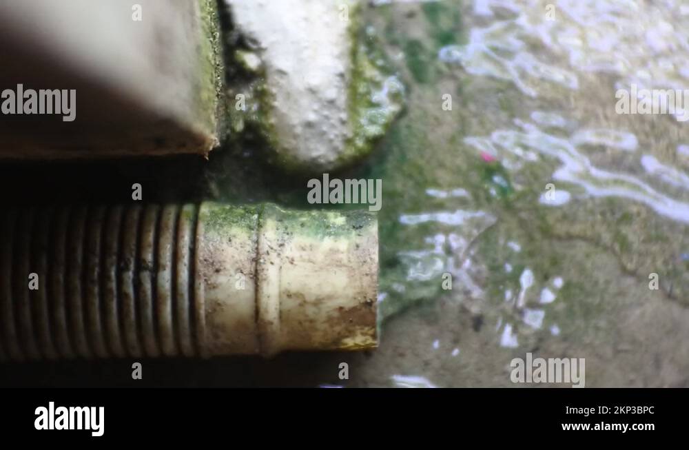 water coming out of washing machine drain pipe Stock Video Footage Alamy