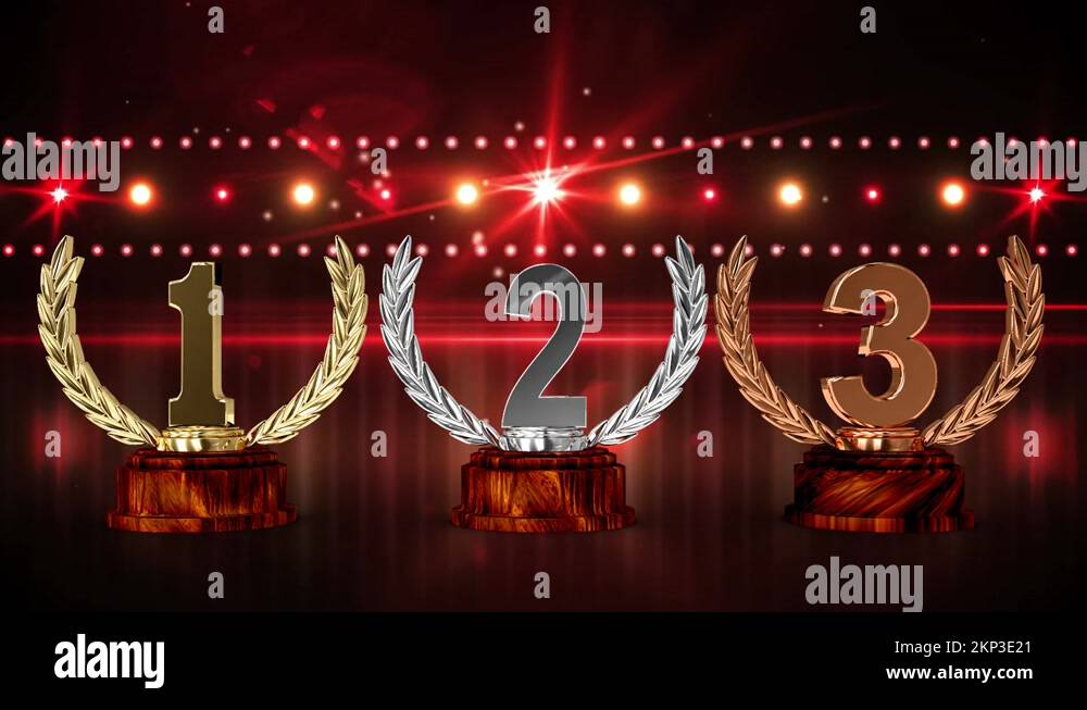 Animation of first, second and third place award trophies at floodlit ...