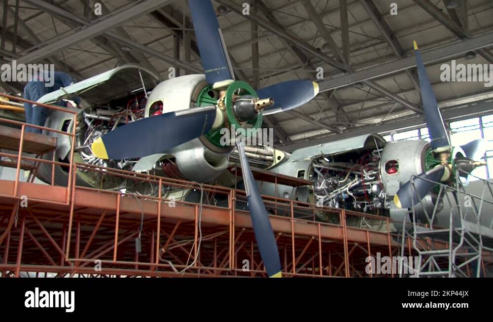 Performing work in engine compartment of An12 (NATO Cub) aircraft