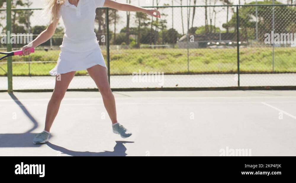 Video of midsection of caucasian female tennis player holding racket ...