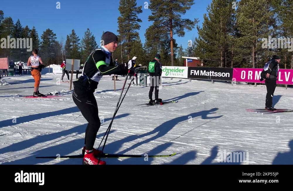 Cross Country Skiers resting at stop on Vasaloppet, world's biggest ski