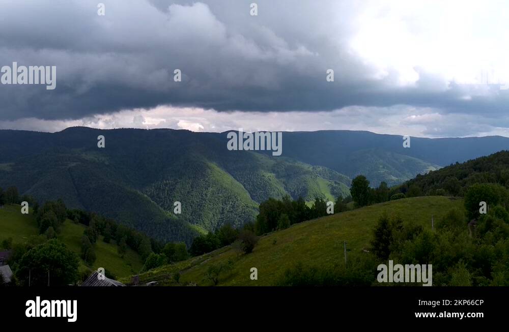 Dark Clouds Seen In The Distance Meaning A Storm Is Coming In Apuseni Stock Video Footage Alamy