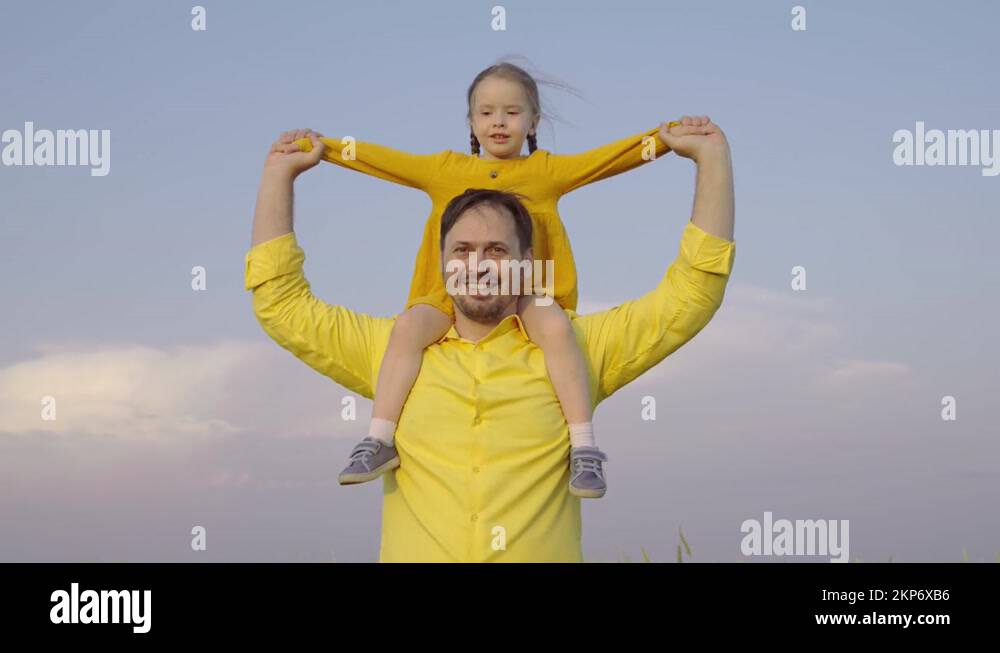 Child, girl, dad running across field. Daughter kid, father play run