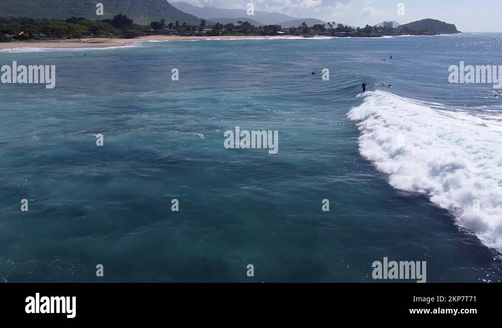 Surf spot Makaha Beach with surfer riding the wave. Oahu, Hawaii travel