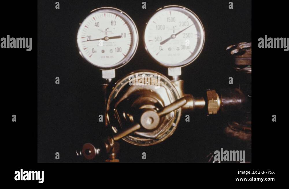 1960s Closeup of pressure gauges on metal Helium and Hydrogen tank