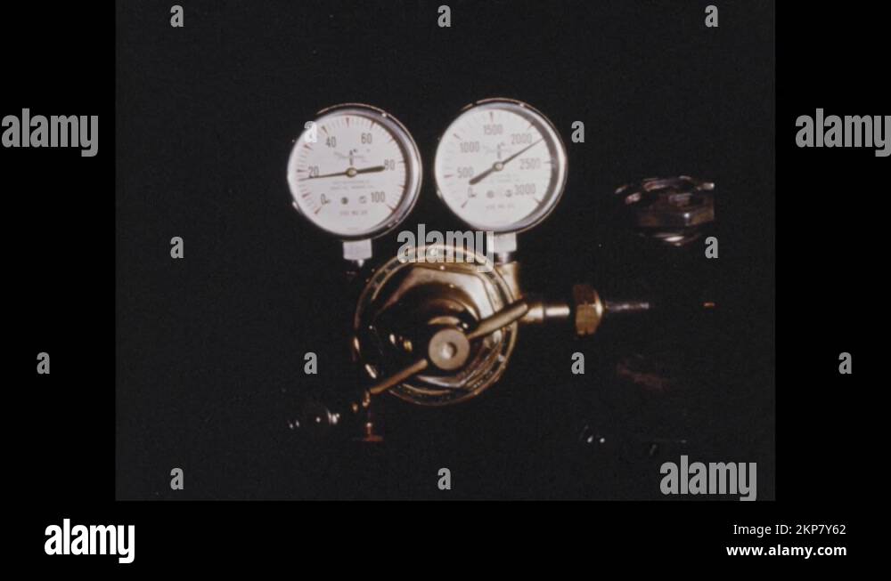 1960s Closeup of pressure gauges on metal Helium and Hydrogen tank