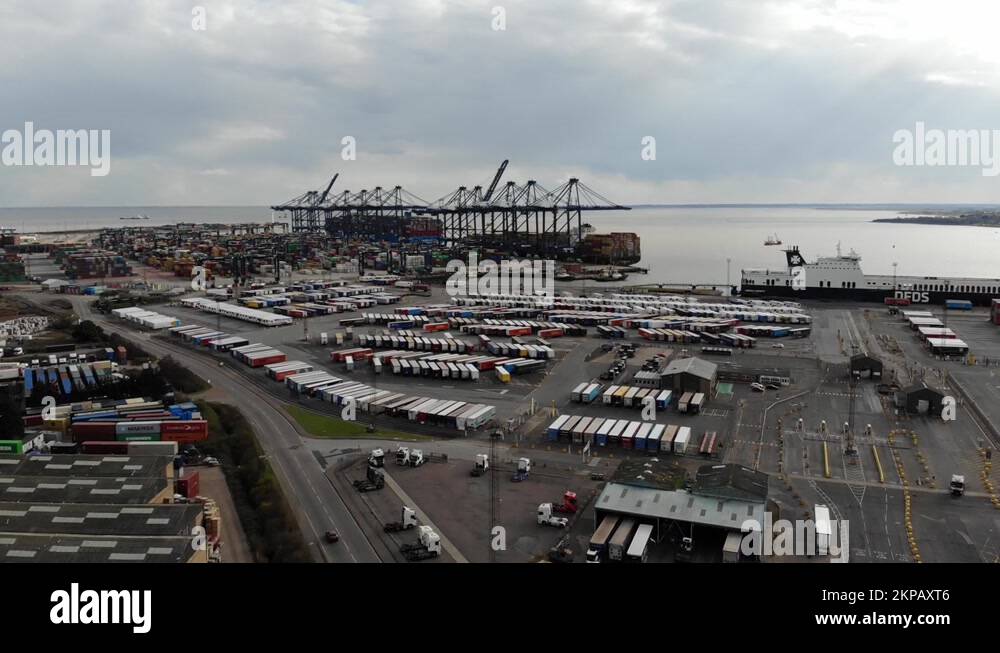 Shipping container are stacked up in the Port of Felixstowe, Suffolk ...
