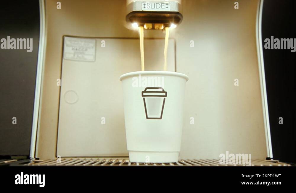 Coffee slowly pouring and dripping into cup on Express Vending machine