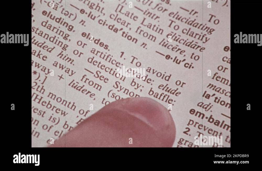 Finger pointing word in dictionary Stock Videos & Footage HD and 4K