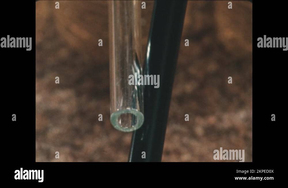 1980s Charged glass rods placed next to others repel each other