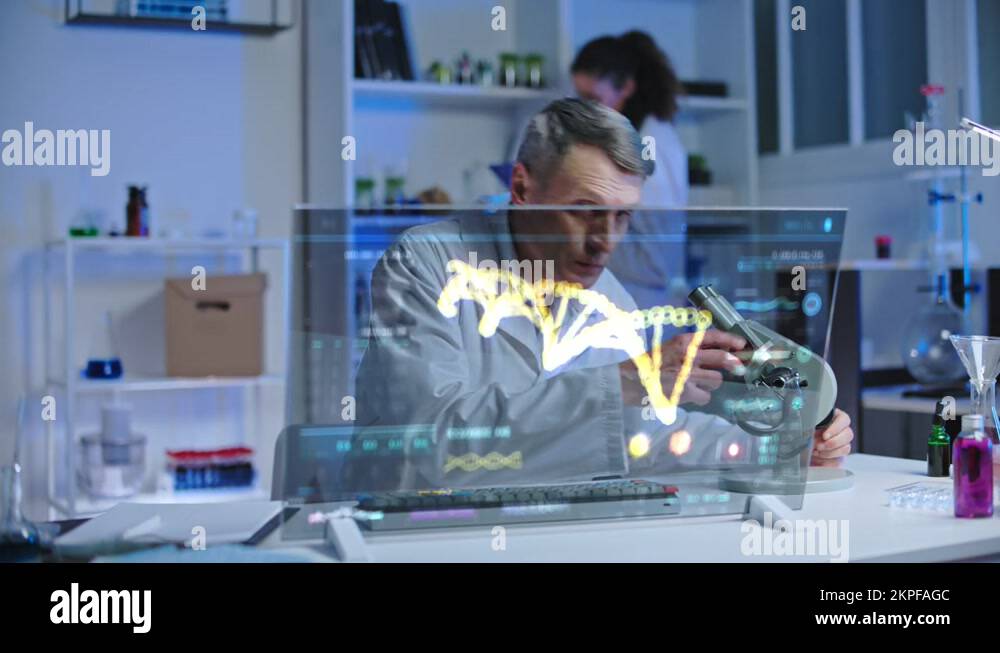 Lab worker examining biological material sample under microscope, dna