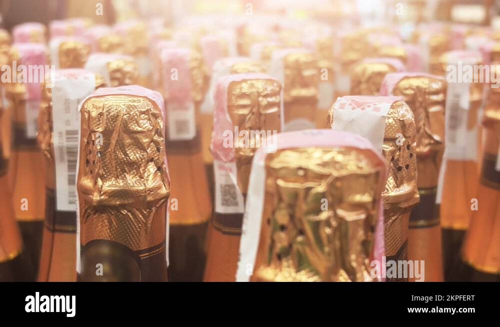 Champagne bottles line up in a liquor store, ABC store, or supermarket