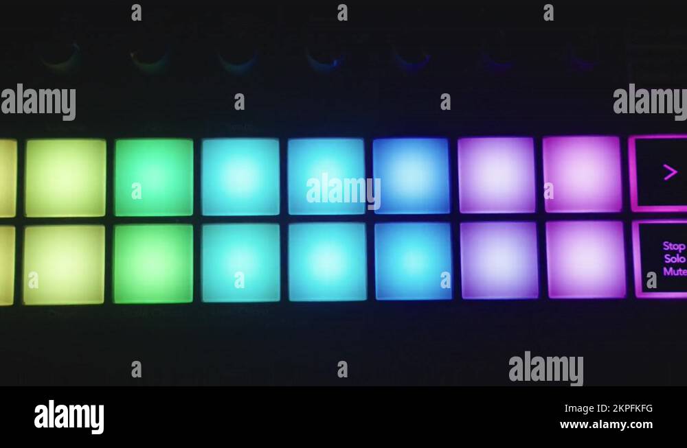 Rainbow colored neon lights on midi controller flashing in the dark