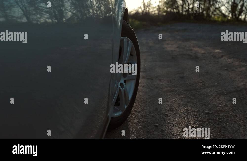 Driving a car is a country road. Wheel spinning POV Point of View, day country Stock Video