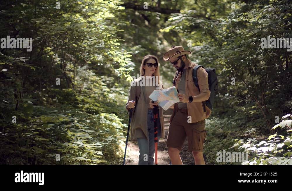 Trekker Nordic Walking Trekking Sticks In Wood. Trekker Tracking On Jungle Stock Video Footage