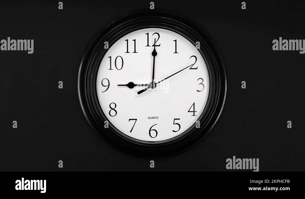 Timelapse. Wall Clock Face Beginning Of Time Of 9.00 Am Or Pm. 4k